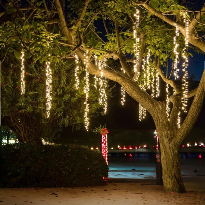 Tenda luminosa per esterno 1080 Led con nastri pendenti - Bianco Caldo