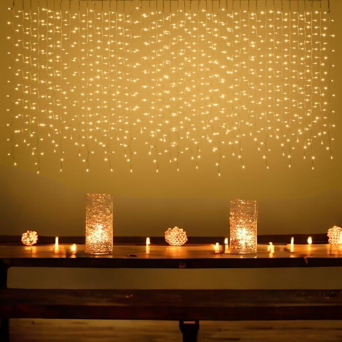 Tenda luminosa per esterno 840 Led sfalsata prolungabile - Bianco Caldo
