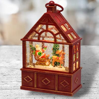 Serra natalizia luminosa rossa con effetto palla di neve - Babbo Natale