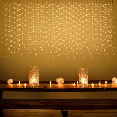 Tenda luminosa per esterno 840 Led sfalsata prolungabile - Bianco Caldo